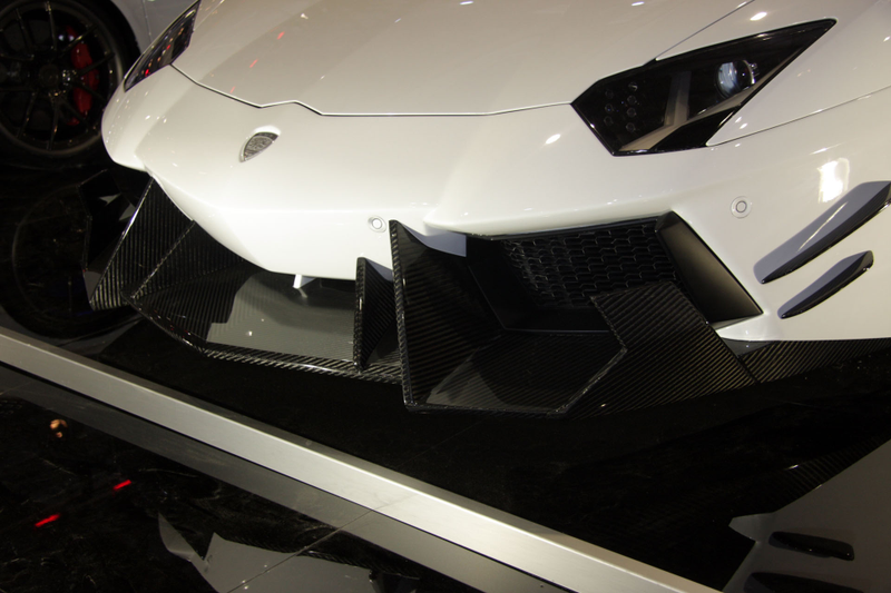 Illustration for article titled Tuner Cars Like DMC's Lambos Must Be Great At Cutting Off Legs